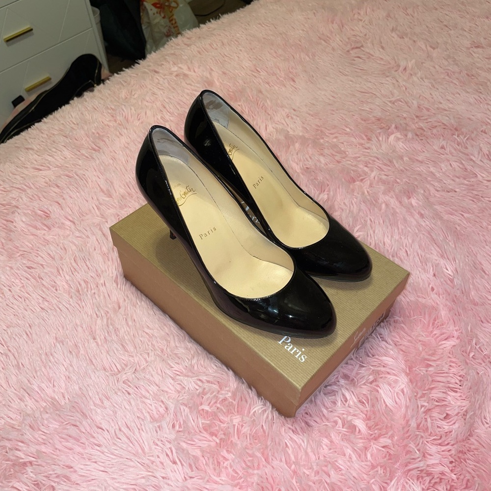 Christian Louboutins black heels